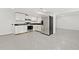 This kitchen features stainless steel appliances and white cabinets at 4205 Mabry Ne Rd, Roswell, GA 30075