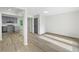 Spacious living area with stylish flooring and an open layout connecting to the kitchen area at 4205 Mabry Ne Rd, Roswell, GA 30075