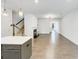 Open-concept living space with fireplace, hardwood floors, and ample natural light at 4922 Longview Walk, Decatur, GA 30035