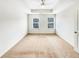 Bright main bedroom with a ceiling fan and two windows providing ample light at 4922 Longview Walk, Decatur, GA 30035