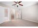 Bedroom with carpet, ensuite bathroom and a walk-in closet at 4957 Day Lily Nw Way, Acworth, GA 30102