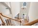 Bright foyer boasts high ceilings, chandelier, hardwood floors and a beautiful entry door at 4957 Day Lily Nw Way, Acworth, GA 30102