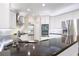 Kitchen with granite countertops, stainless steel appliances, and ample white cabinetry at 4957 Day Lily Nw Way, Acworth, GA 30102