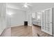 This living room has hardwood floors and French doors that connect to another room at 613 Wiley Ct, Canton, GA 30115