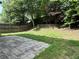 Backyard featuring a patio and a grass area at 143 Ilex Dr, Canton, GA 30114
