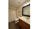Bathroom featuring tile floor, toilet, tub, vanity and mirror at 143 Ilex Dr, Canton, GA 30114