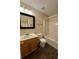 Standard bathroom features a single sink vanity, mirror, toilet, and shower-tub combination at 143 Ilex Dr, Canton, GA 30114