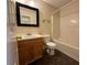 Bathroom featuring a vanity with storage, a framed mirror, and a shower-tub combo at 143 Ilex Dr, Canton, GA 30114