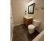 Standard bathroom features a single sink vanity, toilet, tub with tile floors at 143 Ilex Dr, Canton, GA 30114