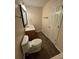 Bathroom features ceramic tile flooring, mirror, vanity, and toilet at 143 Ilex Dr, Canton, GA 30114