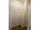 A walk-in closet with tan carpet and white wire shelving at 143 Ilex Dr, Canton, GA 30114