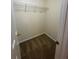 Walk-in closet featuring a single shelf for organized storage at 143 Ilex Dr, Canton, GA 30114