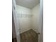 A compact closet with carpeted floor and wire shelving provides storage space at 143 Ilex Dr, Canton, GA 30114