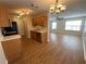 Bright kitchen featuring stainless steel appliances, wood cabinets, and hardwood floors at 143 Ilex Dr, Canton, GA 30114