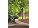 Community walking trail with a dog waste station at 143 Ilex Dr, Canton, GA 30114
