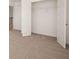 Bedroom featuring a closet and carpeted floors at 1851 Lacebark Elm Way, Lawrenceville, GA 30045