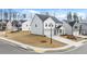Beautifully designed two-story home with a two-car garage, landscaped yard, and modern curb appeal at 1851 Lacebark Elm Way, Lawrenceville, GA 30045