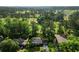 Aerial view showcasing the property's position next to a golf course and green surroundings at 4379 Bonaparte Dr, Tucker, GA 30084