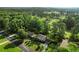 A lovely home with an expansive lawn adjoined by a golf course and abundant trees at 4379 Bonaparte Dr, Tucker, GA 30084