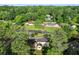Aerial view of home with mature trees in an established neighborhood at 4379 Bonaparte Dr, Tucker, GA 30084