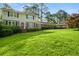 Charming two-story home with a well-manicured lawn and a covered carport at 4379 Bonaparte Dr, Tucker, GA 30084