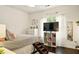 Cozy bedroom featuring soft bedding, decorative pillows, natural lighting, and stylish decor at 827 Pinehurst Dr, Woodstock, GA 30188