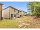 A spacious backyard featuring a patio and plenty of green space at 891 Channel Dr, Lawrenceville, GA 30046