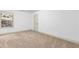 Bright bedroom with carpet and a window at 891 Channel Dr, Lawrenceville, GA 30046