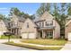 Attractive two-story home with a well-kept lawn and symmetrical facade at 891 Channel Dr, Lawrenceville, GA 30046