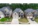 Beautiful two-story brick home with a well-manicured front yard and driveway at 891 Channel Dr, Lawrenceville, GA 30046