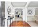 Welcoming foyer with hardwood floors and views into the living and dining areas at 891 Channel Dr, Lawrenceville, GA 30046