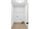 A simple laundry room featuring tile floors and wire shelving for storage at 891 Channel Dr, Lawrenceville, GA 30046