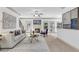 Spacious living room featuring a fireplace, plush seating, and neutral decor at 891 Channel Dr, Lawrenceville, GA 30046