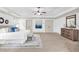 Spacious primary bedroom suite with carpet floors and lots of natural light at 891 Channel Dr, Lawrenceville, GA 30046