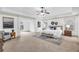 Spacious primary bedroom with lots of natural light and a decorative rug at 891 Channel Dr, Lawrenceville, GA 30046