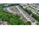 Aerial view of a residential neighborhood with tree-lined streets and well-maintained homes at 891 Channel Dr, Lawrenceville, GA 30046