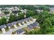 Aerial shot of homes situated amongst mature trees in a well maintained neighborhood at 891 Channel Dr, Lawrenceville, GA 30046