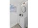 Stylish bathroom with modern vanity, round mirror, and contemporary lighting for a clean, updated look at 101 Fairfield Ct, Atlanta, GA 30314
