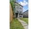Stylish two-story home with a modern exterior, featuring a well-manicured lawn and a sleek walkway at 101 Fairfield Ct, Atlanta, GA 30314