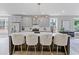 Modern kitchen with quartz counters, pendant lights, stainless appliances, and an island with barstool seating at 101 Fairfield Ct, Atlanta, GA 30314