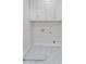 Bright laundry area with white cabinetry and modern marble flooring at 101 Fairfield Ct, Atlanta, GA 30314