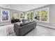 Stylish living room with large windows offering natural light, showcasing the modern decor at 101 Fairfield Ct, Atlanta, GA 30314