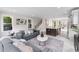 Open-concept living area connected to kitchen, featuring contemporary decor and abundant natural light at 101 Fairfield Ct, Atlanta, GA 30314