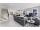 Open-concept living area flowing into the kitchen, featuring contemporary furnishings and a spacious design at 101 Fairfield Ct, Atlanta, GA 30314