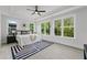 Bright main bedroom with ample windows, tray ceiling and en-suite bath provides lots of natural light at 101 Fairfield Ct, Atlanta, GA 30314