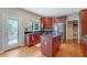 Well-equipped kitchen with stainless steel appliances and cherry wood cabinetry at 1663 Willow Way, Woodstock, GA 30188