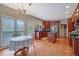 Bright kitchen featuring wood floors, a breakfast nook, stainless steel appliances and ample cabinetry at 1663 Willow Way, Woodstock, GA 30188