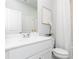 Spotless bathroom featuring a white vanity, contemporary fixtures, and stylish decor at 1781 Jordan Brook Dr, Lawrenceville, GA 30043