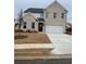 Beautiful two-story home features a two-car garage, brick facade, and a newly sodded lawn at 1781 Jordan Brook Dr, Lawrenceville, GA 30043