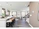 Contemporary kitchen featuring a center island with barstool seating that opens to the living area at 1781 Jordan Brook Dr, Lawrenceville, GA 30043